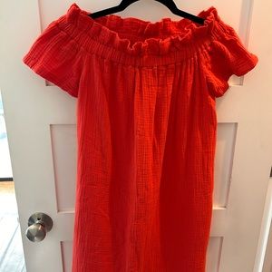 Orange dress by Amadi. Size XS, petite. Off shoulder with 2 pockets.